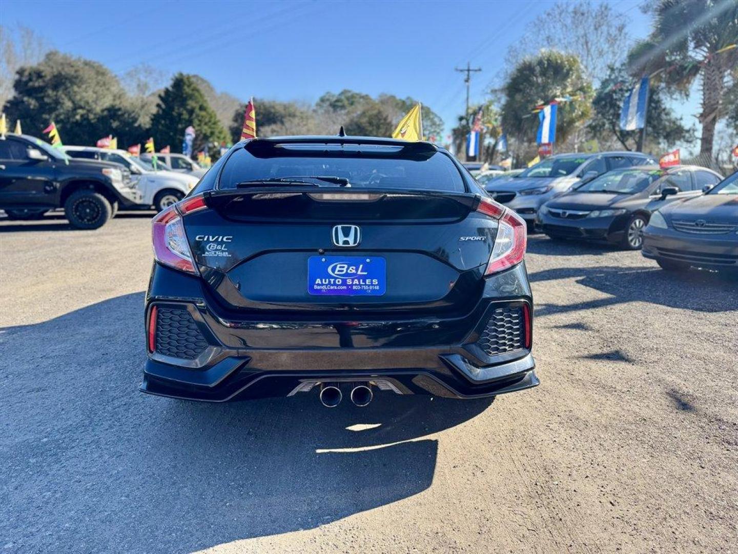 2018 Black /Black Honda Civic (SHHFK7G44JU) with an 1.5l I-4 DI Dohc T/C 1.5l engine, Manual transmission, located at 745 East Steele Rd., West Columbia, SC, 29170, (803) 755-9148, 33.927212, -81.148483 - Photo#4