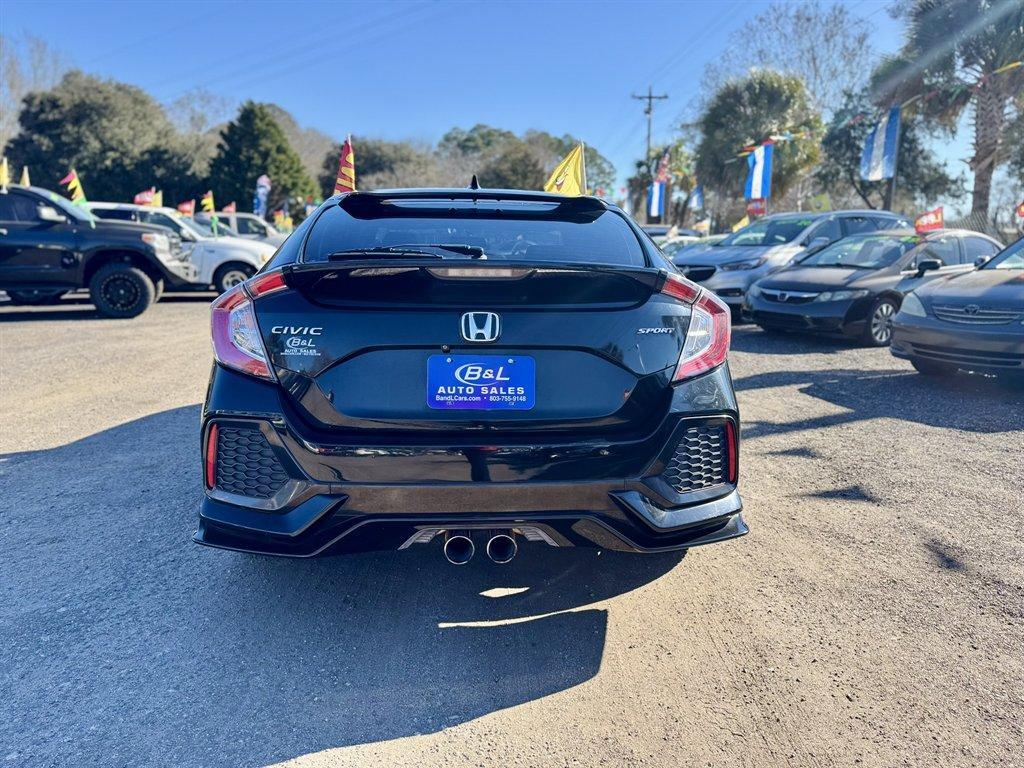2018 Black /Black Honda Civic (SHHFK7G44JU) with an 1.5l I-4 DI Dohc T/C 1.5l engine, Manual transmission, located at 745 East Steele Rd., West Columbia, SC, 29170, (803) 755-9148, 33.927212, -81.148483 - Photo#4