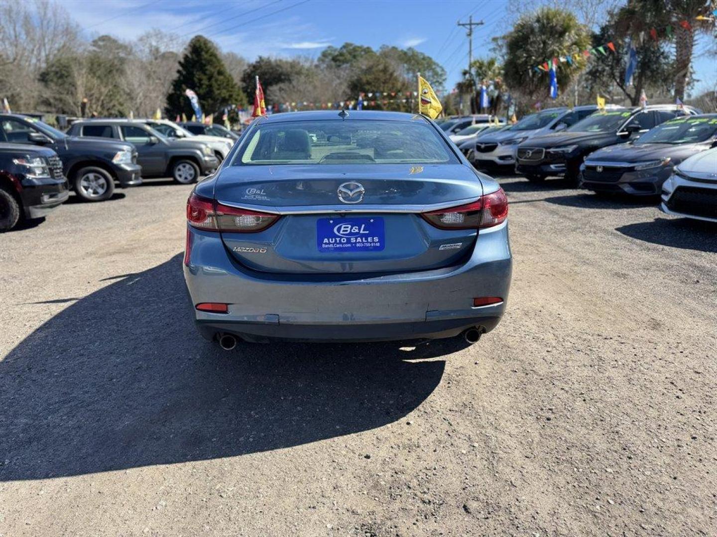 2016 Blue /Grey Mazda Mazda6 (JM1GJ1V59G1) with an 2.5l I-4 DI Dohc 2.5l engine, Automatic transmission, located at 745 East Steele Rd., West Columbia, SC, 29170, (803) 755-9148, 33.927212, -81.148483 - Photo#4
