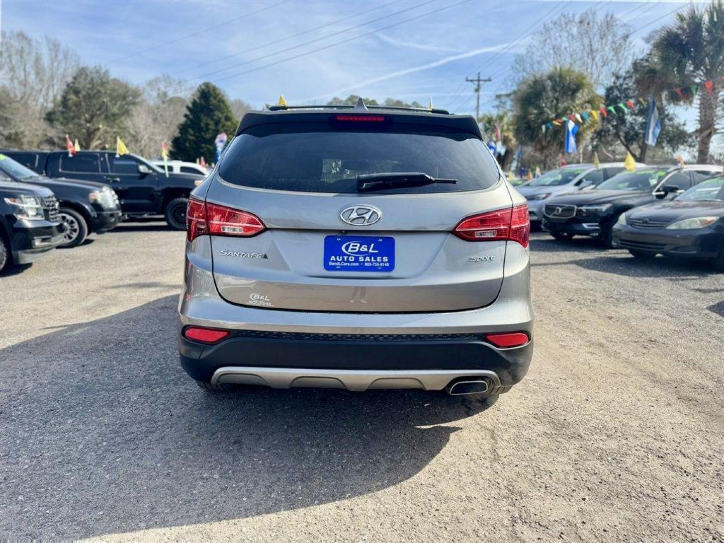 2014 Bronze /Grey Hyundai Santa FE Sport (5XYZU3LB6EG) with an 2.4l I-4 DI Dohc 2.4l engine, Automatic transmission, located at 745 East Steele Rd., West Columbia, SC, 29170, (803) 755-9148, 33.927212, -81.148483 - Photo#4