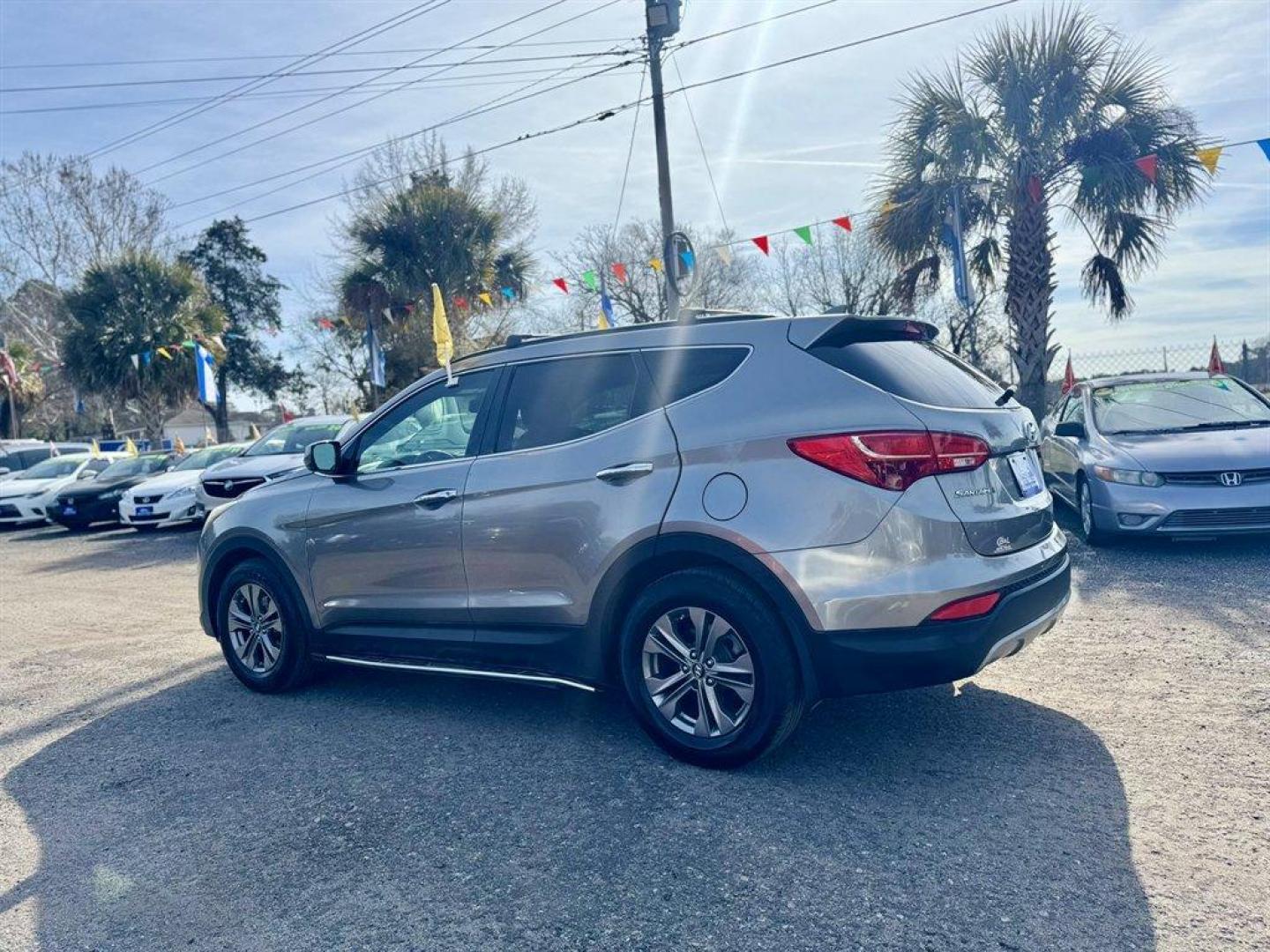 2014 Bronze /Grey Hyundai Santa FE Sport (5XYZU3LB6EG) with an 2.4l I-4 DI Dohc 2.4l engine, Automatic transmission, located at 745 East Steele Rd., West Columbia, SC, 29170, (803) 755-9148, 33.927212, -81.148483 - Photo#5