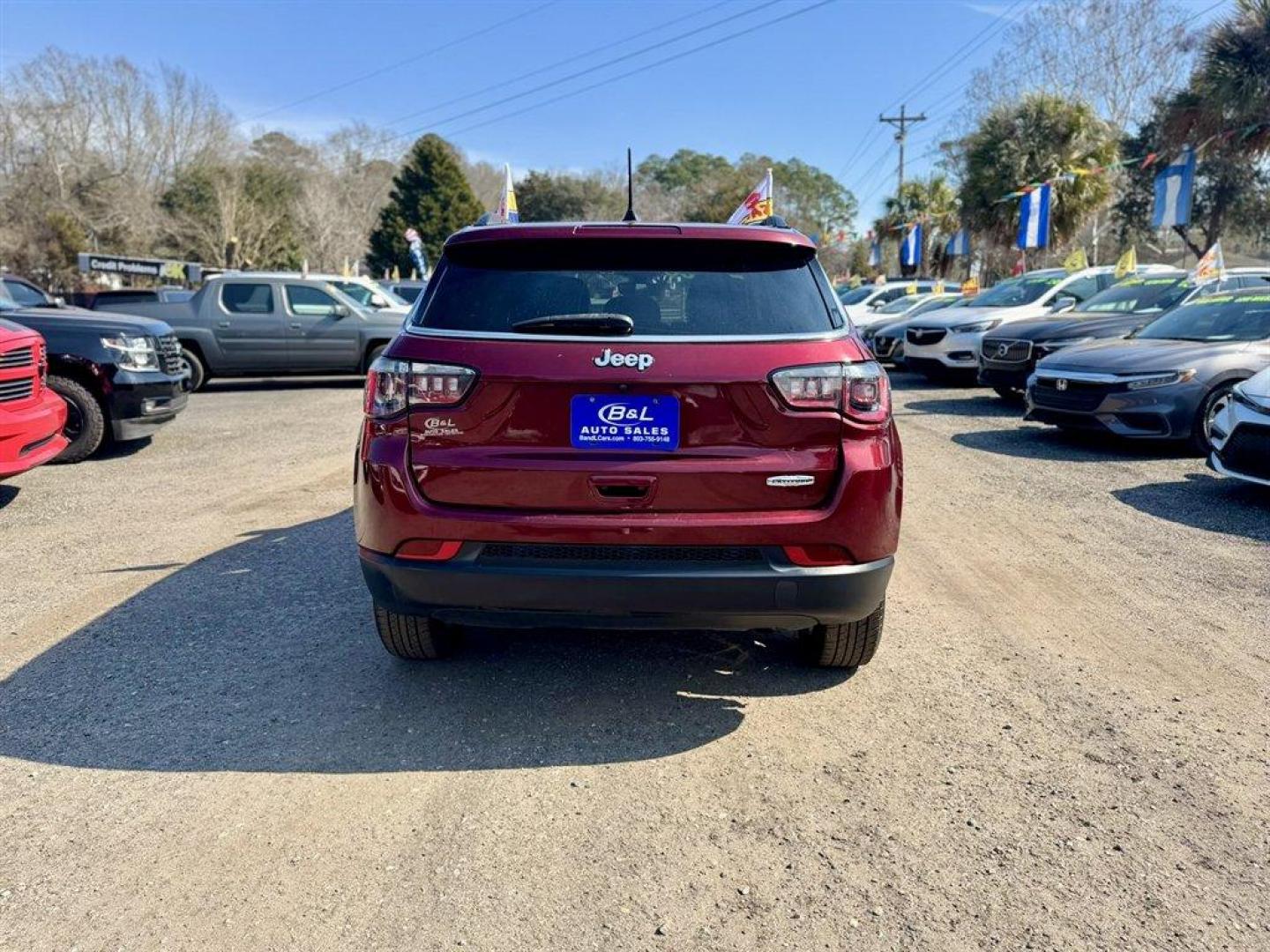 2021 Red /Black Jeep Compass (3C4NJCBB5MT) with an 2.4l I-4 MPI Sohc 2.4l engine, Automatic transmission, located at 745 East Steele Rd., West Columbia, SC, 29170, (803) 755-9148, 33.927212, -81.148483 - Photo#4