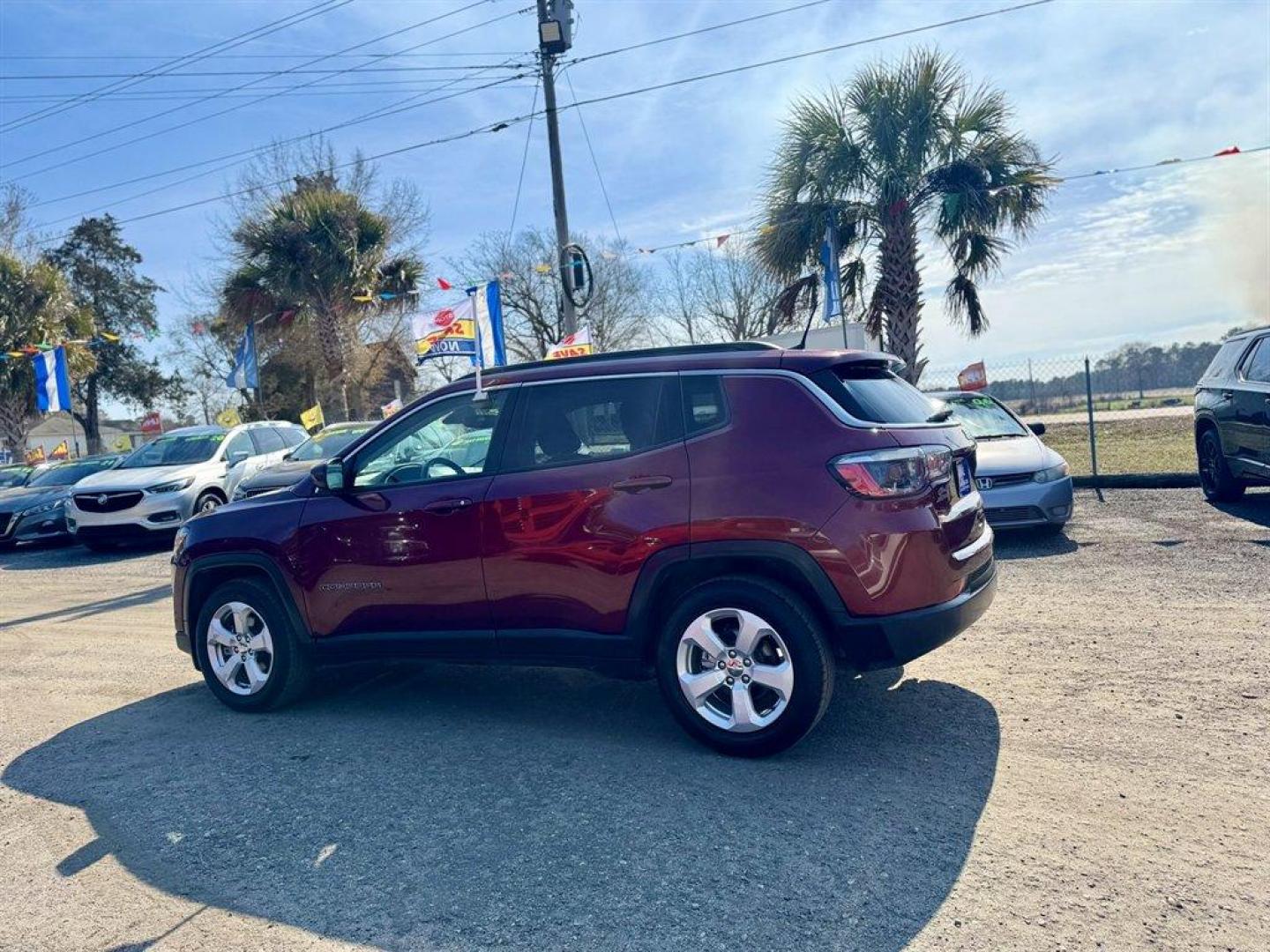 2021 Red /Black Jeep Compass (3C4NJCBB5MT) with an 2.4l I-4 MPI Sohc 2.4l engine, Automatic transmission, located at 745 East Steele Rd., West Columbia, SC, 29170, (803) 755-9148, 33.927212, -81.148483 - Photo#5