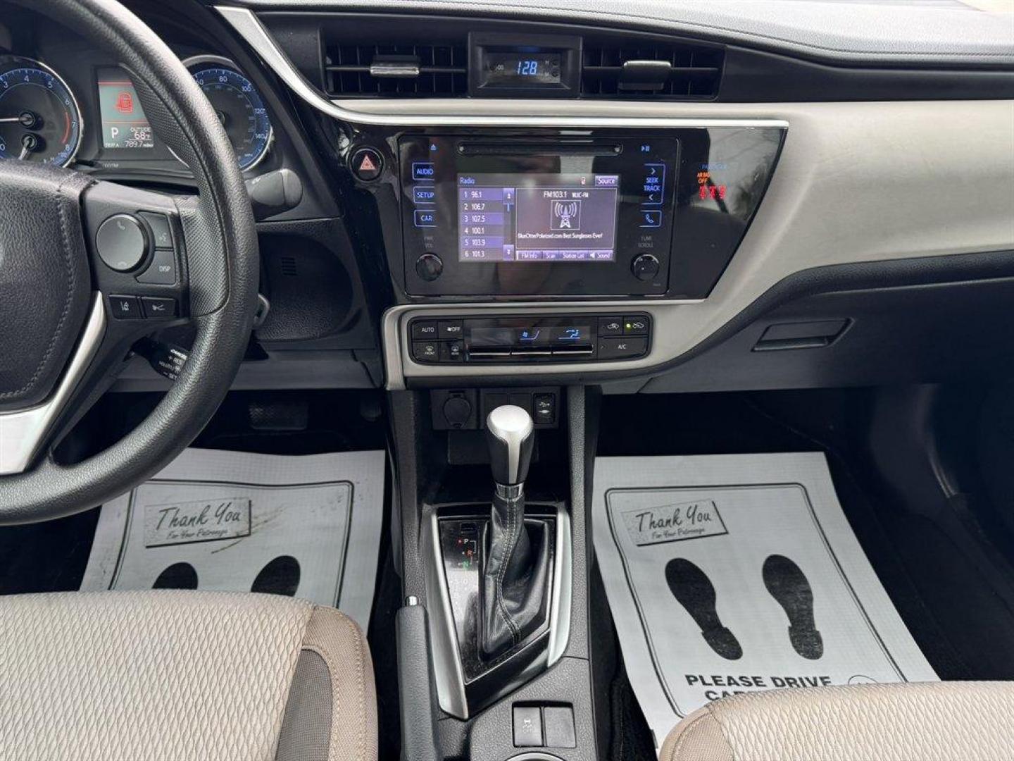 2018 Silver /Grey Toyota Corolla (5YFBURHE0JP) with an 1.8l I-4 EFI Dohc 1.8l engine, Automatic transmission, located at 745 East Steele Rd., West Columbia, SC, 29170, (803) 755-9148, 33.927212, -81.148483 - Photo#11