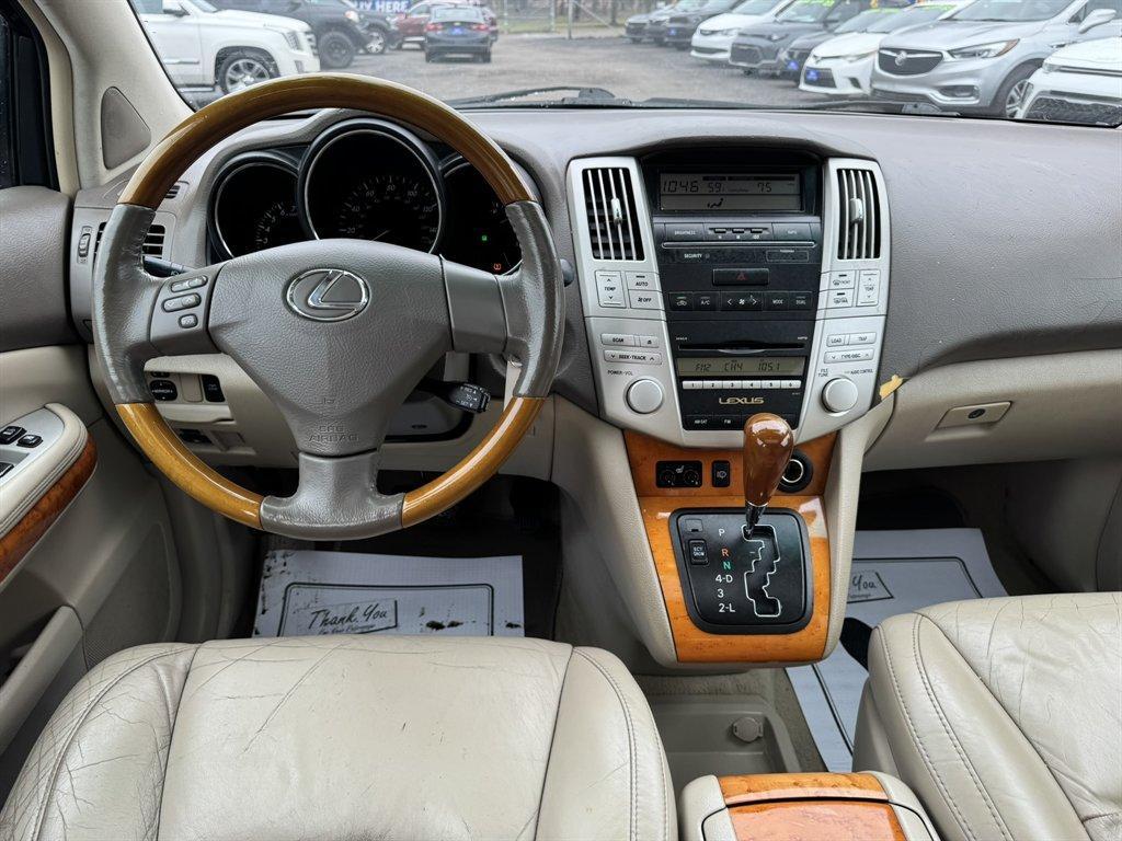 2009 Black /Beige Lexus RX 350 (2T2HK31U39C) with an 3.5l V6 SFI Dohc 3.5l engine, Automatic transmission, located at 745 East Steele Rd., West Columbia, SC, 29170, (803) 755-9148, 33.927212, -81.148483 - Photo#6