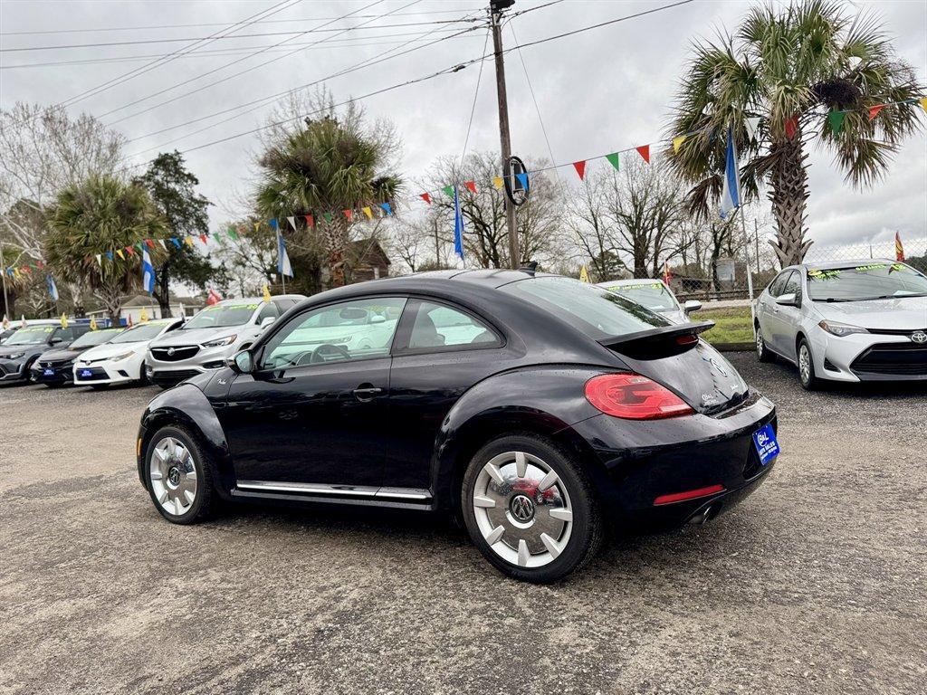 2013 Black /Black Volkswagen Beetle (3VWVS7AT2DM) with an 2.0l I-4 DI Dohc T/C 2.0l engine, Automatic transmission, located at 745 East Steele Rd., West Columbia, SC, 29170, (803) 755-9148, 33.927212, -81.148483 - Photo#5