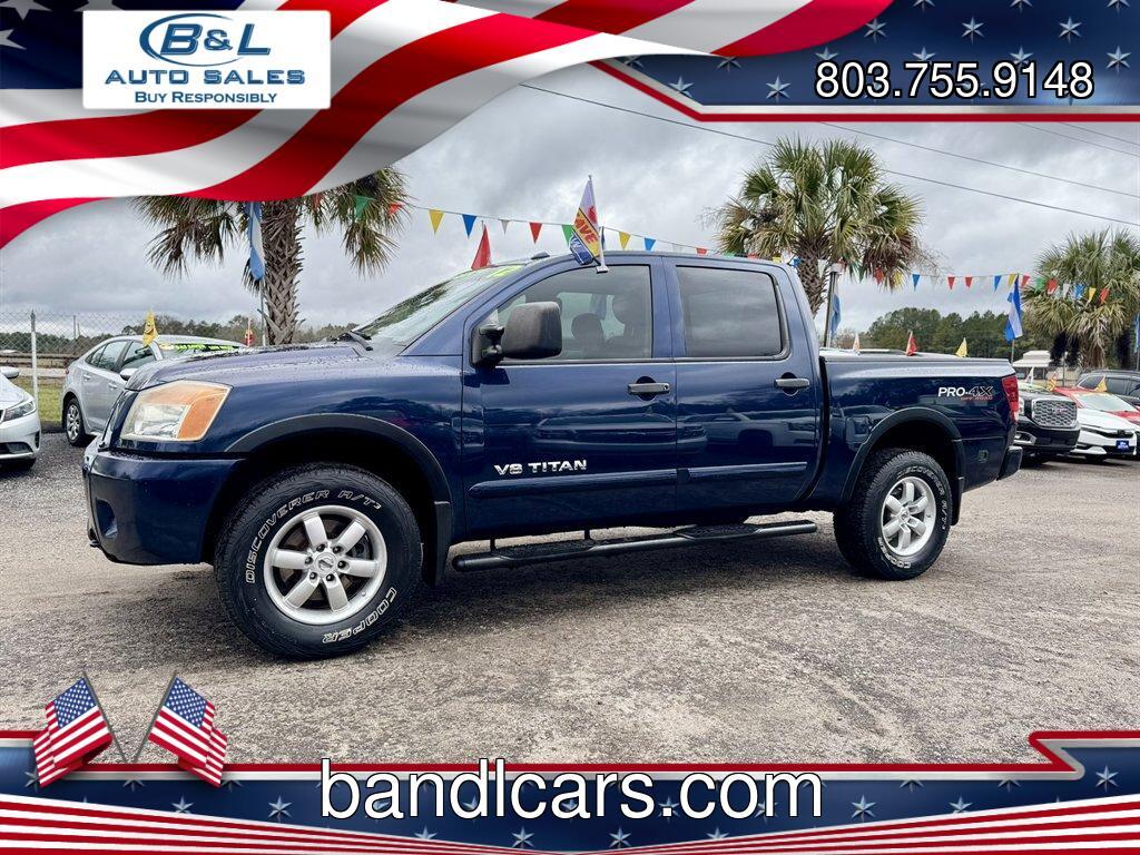 2012 Blue /Black Nissan Titan (1N6BA0ECXCN) with an 5.6l V8 MPI Dohc Flex 5.6 engine, Automatic transmission, located at 745 East Steele Rd., West Columbia, SC, 29170, (803) 755-9148, 33.927212, -81.148483 - Photo#0