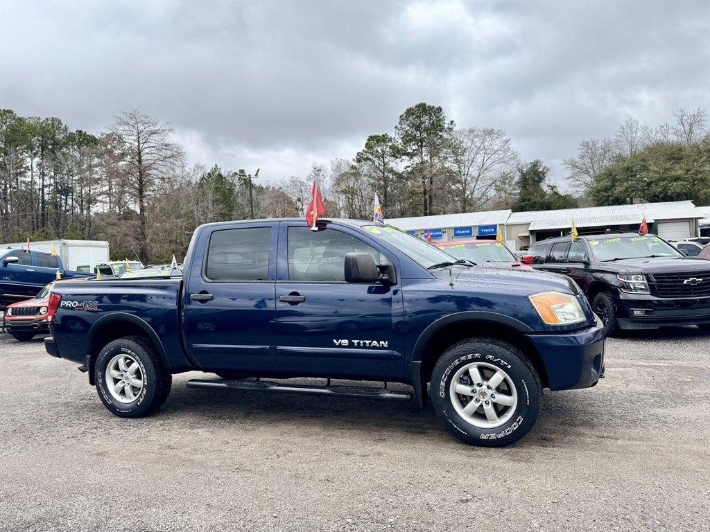 2012 Blue /Black Nissan Titan (1N6BA0ECXCN) with an 5.6l V8 MPI Dohc Flex 5.6 engine, Automatic transmission, located at 745 East Steele Rd., West Columbia, SC, 29170, (803) 755-9148, 33.927212, -81.148483 - Photo#2