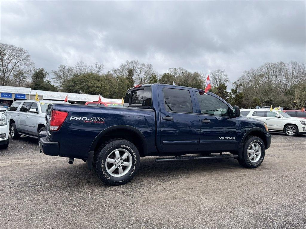 2012 Blue /Black Nissan Titan (1N6BA0ECXCN) with an 5.6l V8 MPI Dohc Flex 5.6 engine, Automatic transmission, located at 745 East Steele Rd., West Columbia, SC, 29170, (803) 755-9148, 33.927212, -81.148483 - Photo#3