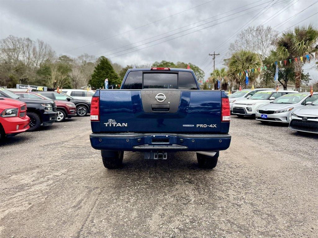 2012 Blue /Black Nissan Titan (1N6BA0ECXCN) with an 5.6l V8 MPI Dohc Flex 5.6 engine, Automatic transmission, located at 745 East Steele Rd., West Columbia, SC, 29170, (803) 755-9148, 33.927212, -81.148483 - Photo#4