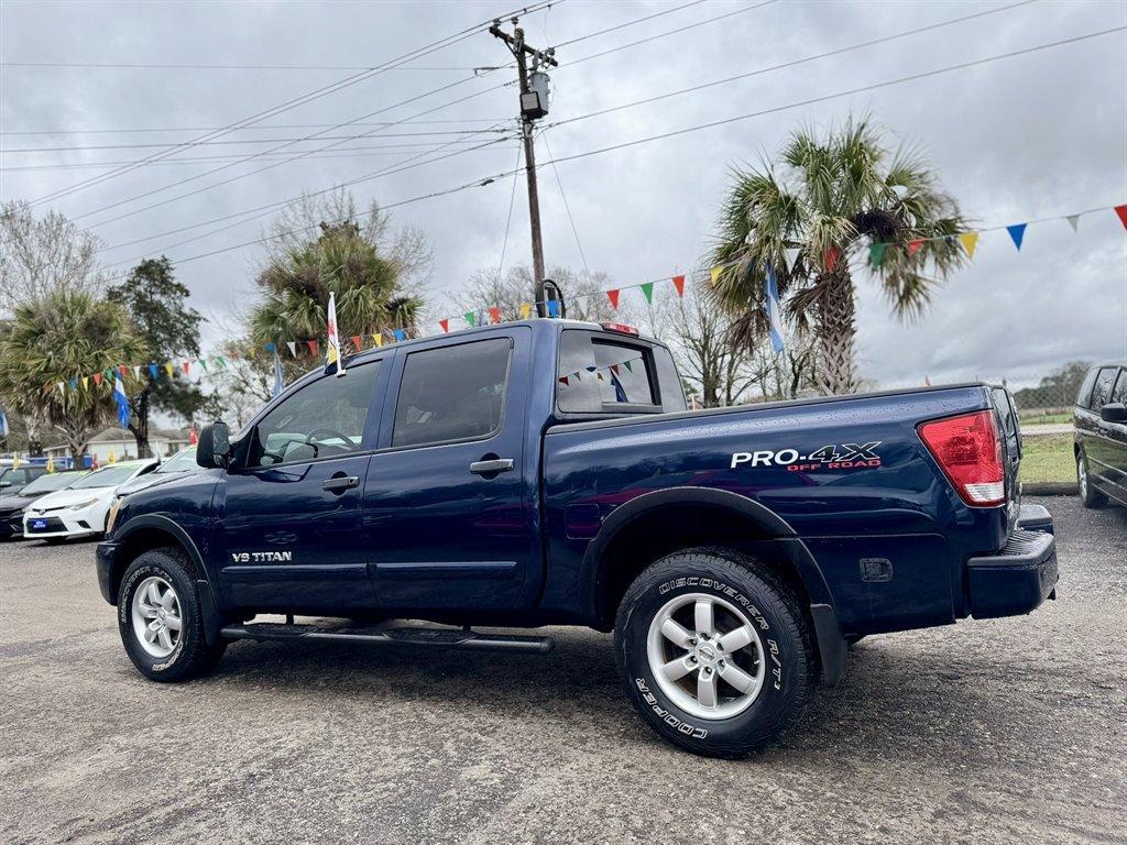 2012 Blue /Black Nissan Titan (1N6BA0ECXCN) with an 5.6l V8 MPI Dohc Flex 5.6 engine, Automatic transmission, located at 745 East Steele Rd., West Columbia, SC, 29170, (803) 755-9148, 33.927212, -81.148483 - Photo#5