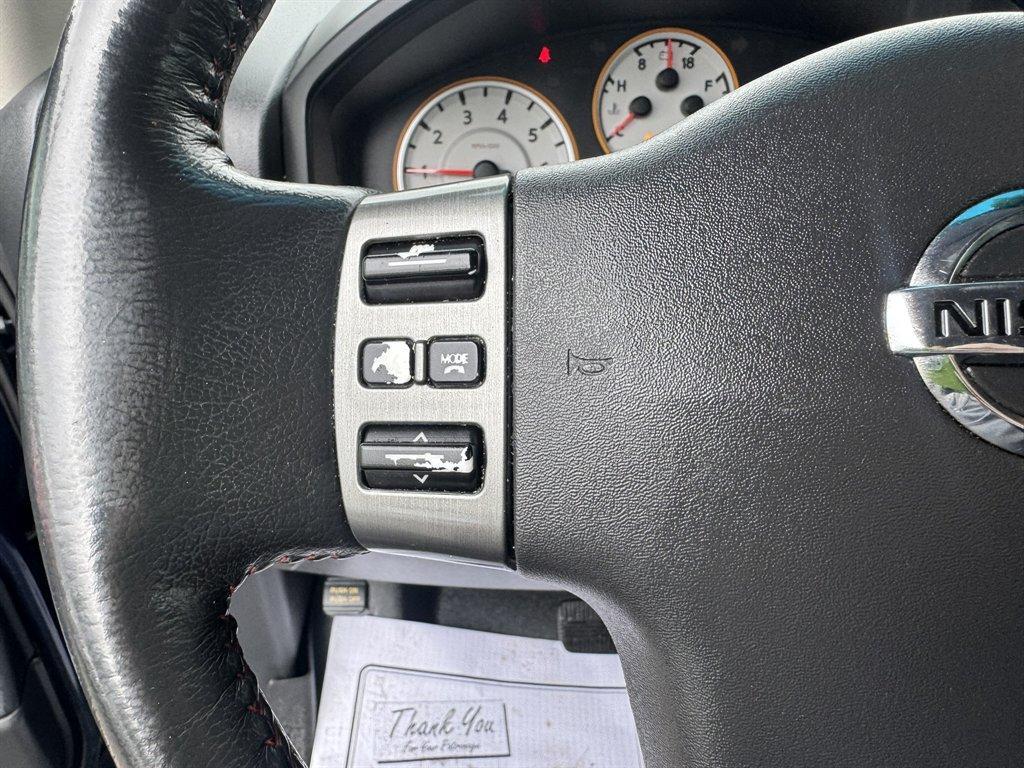 2012 Blue /Black Nissan Titan (1N6BA0ECXCN) with an 5.6l V8 MPI Dohc Flex 5.6 engine, Automatic transmission, located at 745 East Steele Rd., West Columbia, SC, 29170, (803) 755-9148, 33.927212, -81.148483 - Photo#8