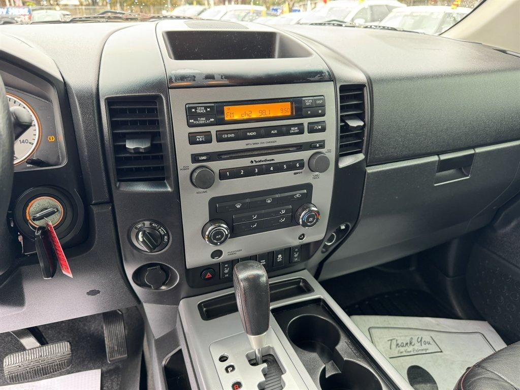 2012 Blue /Black Nissan Titan (1N6BA0ECXCN) with an 5.6l V8 MPI Dohc Flex 5.6 engine, Automatic transmission, located at 745 East Steele Rd., West Columbia, SC, 29170, (803) 755-9148, 33.927212, -81.148483 - Photo#12