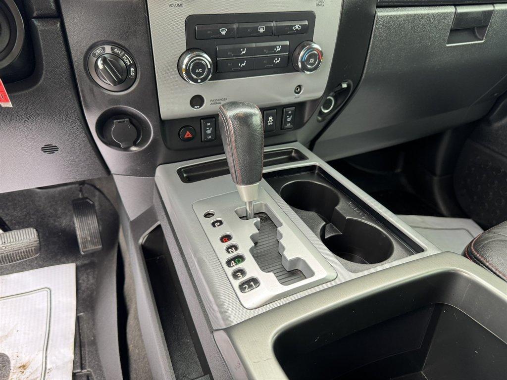 2012 Blue /Black Nissan Titan (1N6BA0ECXCN) with an 5.6l V8 MPI Dohc Flex 5.6 engine, Automatic transmission, located at 745 East Steele Rd., West Columbia, SC, 29170, (803) 755-9148, 33.927212, -81.148483 - Photo#13