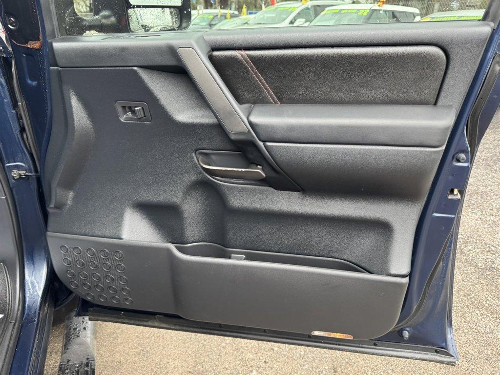 2012 Blue /Black Nissan Titan (1N6BA0ECXCN) with an 5.6l V8 MPI Dohc Flex 5.6 engine, Automatic transmission, located at 745 East Steele Rd., West Columbia, SC, 29170, (803) 755-9148, 33.927212, -81.148483 - Photo#23