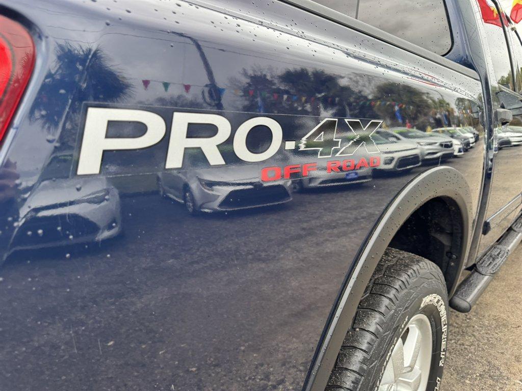 2012 Blue /Black Nissan Titan (1N6BA0ECXCN) with an 5.6l V8 MPI Dohc Flex 5.6 engine, Automatic transmission, located at 745 East Steele Rd., West Columbia, SC, 29170, (803) 755-9148, 33.927212, -81.148483 - Photo#29