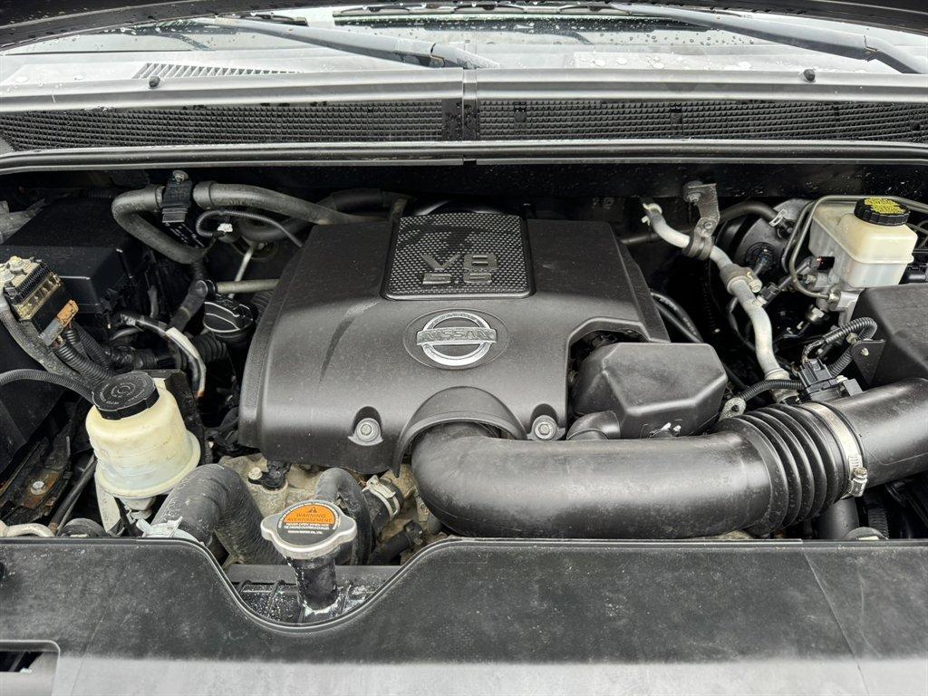 2012 Blue /Black Nissan Titan (1N6BA0ECXCN) with an 5.6l V8 MPI Dohc Flex 5.6 engine, Automatic transmission, located at 745 East Steele Rd., West Columbia, SC, 29170, (803) 755-9148, 33.927212, -81.148483 - Photo#30