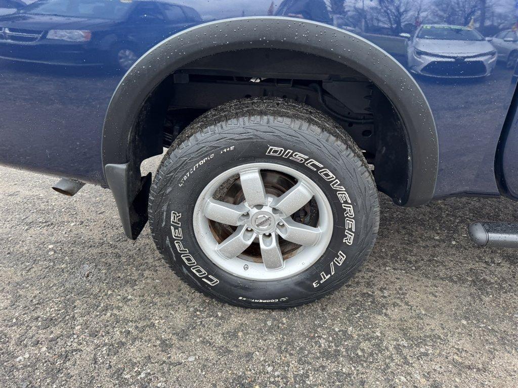 2012 Blue /Black Nissan Titan (1N6BA0ECXCN) with an 5.6l V8 MPI Dohc Flex 5.6 engine, Automatic transmission, located at 745 East Steele Rd., West Columbia, SC, 29170, (803) 755-9148, 33.927212, -81.148483 - Photo#32