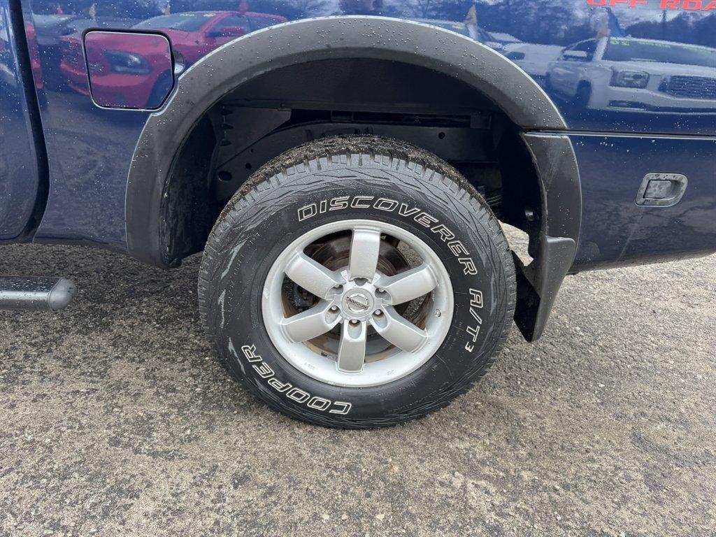 2012 Blue /Black Nissan Titan (1N6BA0ECXCN) with an 5.6l V8 MPI Dohc Flex 5.6 engine, Automatic transmission, located at 745 East Steele Rd., West Columbia, SC, 29170, (803) 755-9148, 33.927212, -81.148483 - Photo#33