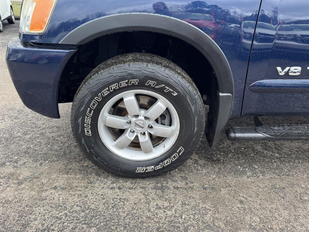 2012 Blue /Black Nissan Titan (1N6BA0ECXCN) with an 5.6l V8 MPI Dohc Flex 5.6 engine, Automatic transmission, located at 745 East Steele Rd., West Columbia, SC, 29170, (803) 755-9148, 33.927212, -81.148483 - Photo#34
