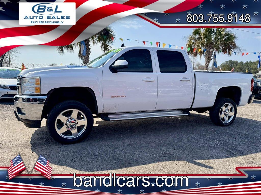 2011 White /Black Chevrolet Silverado 2500 (1GC1KYC85BF) with an 6.6l V8 DI DSL T/C 6.6l engine, Automatic transmission, located at 745 East Steele Rd., West Columbia, SC, 29170, (803) 755-9148, 33.927212, -81.148483 - Photo#0