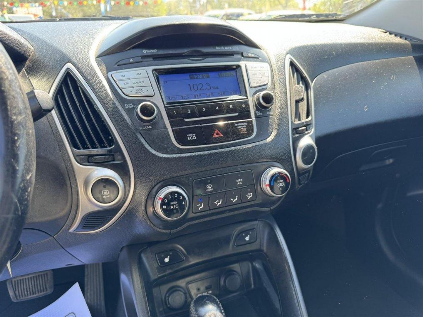 2013 Grey /Black Hyundai Tucson (KM8JUCACXDU) with an 2.4l I-4 MPI Dohc 2.4l engine, Automatic transmission, located at 745 East Steele Rd., West Columbia, SC, 29170, (803) 755-9148, 33.927212, -81.148483 - Photo#12