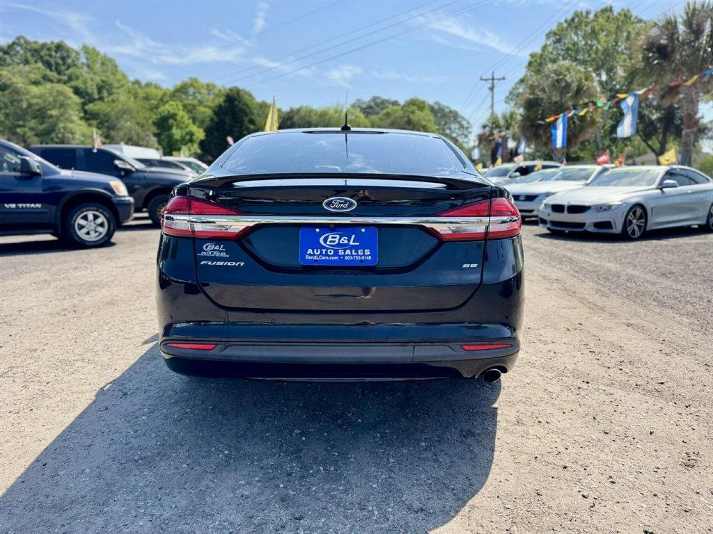 2017 Black /Black Ford Fusion (3FA6P0HDXHR) with an 1.5l I-4 DI Dohc Ecoboost engine, Automatic transmission, located at 745 East Steele Rd., West Columbia, SC, 29170, (803) 755-9148, 33.927212, -81.148483 - Photo#4