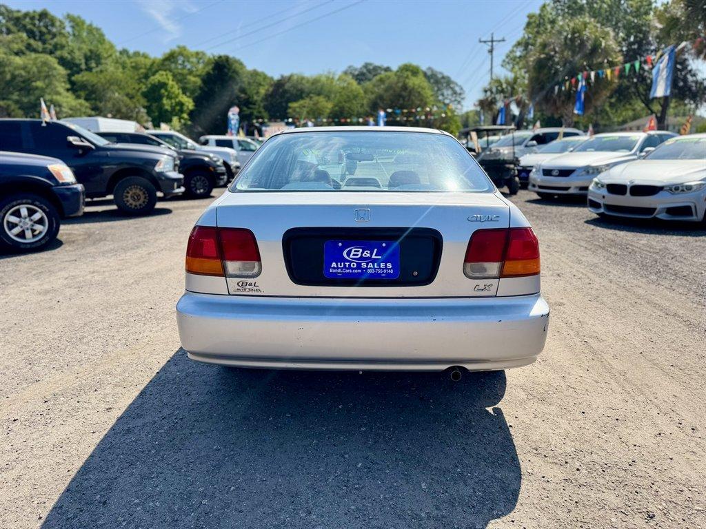 1997 Silver /Grey Honda Civic (2HGEJ6679VH) with an 1.6l I-4 EFI Sohc 1.6l engine, Automatic transmission, located at 745 East Steele Rd., West Columbia, SC, 29170, (803) 755-9148, 33.927212, -81.148483 - Photo#4