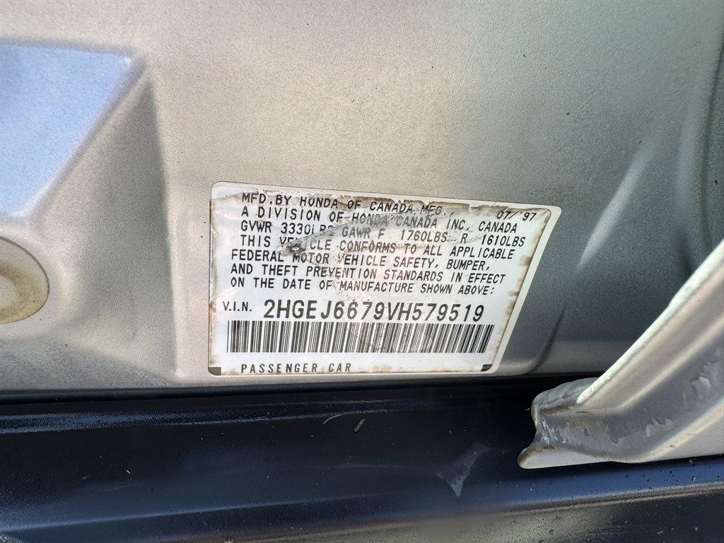 1997 Silver /Grey Honda Civic (2HGEJ6679VH) with an 1.6l I-4 EFI Sohc 1.6l engine, Automatic transmission, located at 745 East Steele Rd., West Columbia, SC, 29170, (803) 755-9148, 33.927212, -81.148483 - Photo#28