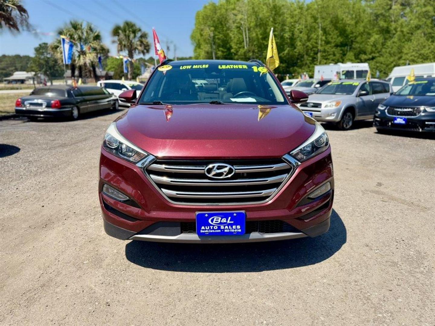 2016 Red /Grey Hyundai Tucson (KM8J33A23GU) with an 1.6l I-4 DI Dohc Cvvt T/C engine, Automatic transmission, located at 745 East Steele Rd., West Columbia, SC, 29170, (803) 755-9148, 33.927212, -81.148483 - Photo#1