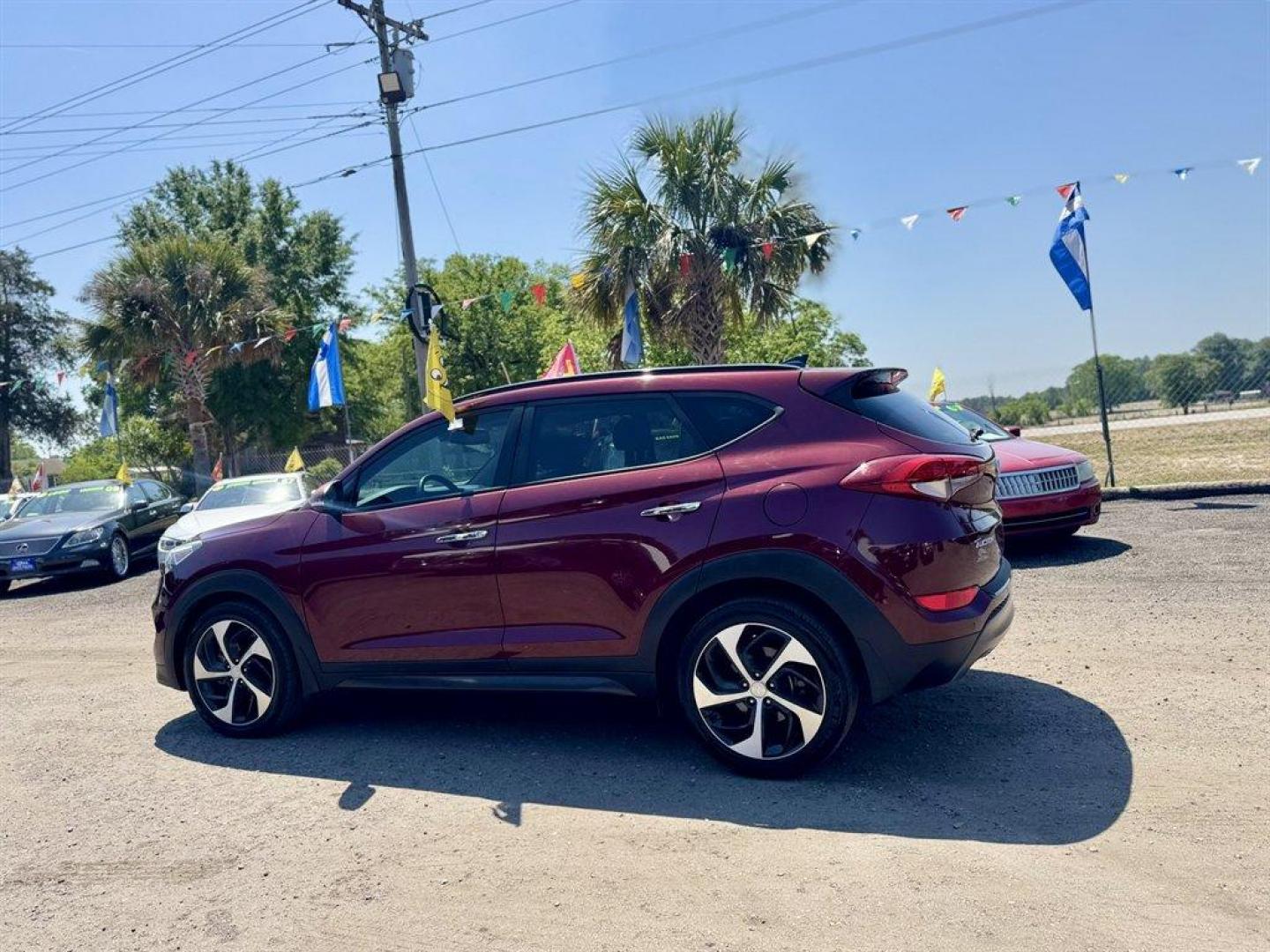 2016 Red /Grey Hyundai Tucson (KM8J33A23GU) with an 1.6l I-4 DI Dohc Cvvt T/C engine, Automatic transmission, located at 745 East Steele Rd., West Columbia, SC, 29170, (803) 755-9148, 33.927212, -81.148483 - Photo#3