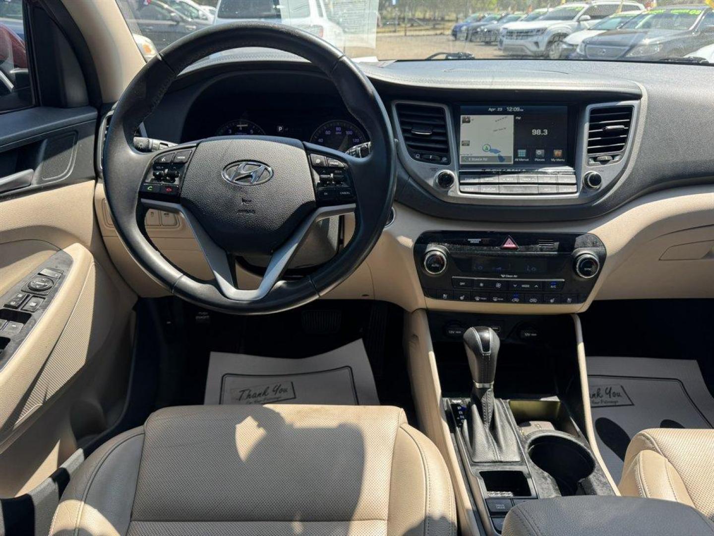 2016 Red /Grey Hyundai Tucson (KM8J33A23GU) with an 1.6l I-4 DI Dohc Cvvt T/C engine, Automatic transmission, located at 745 East Steele Rd., West Columbia, SC, 29170, (803) 755-9148, 33.927212, -81.148483 - Photo#6