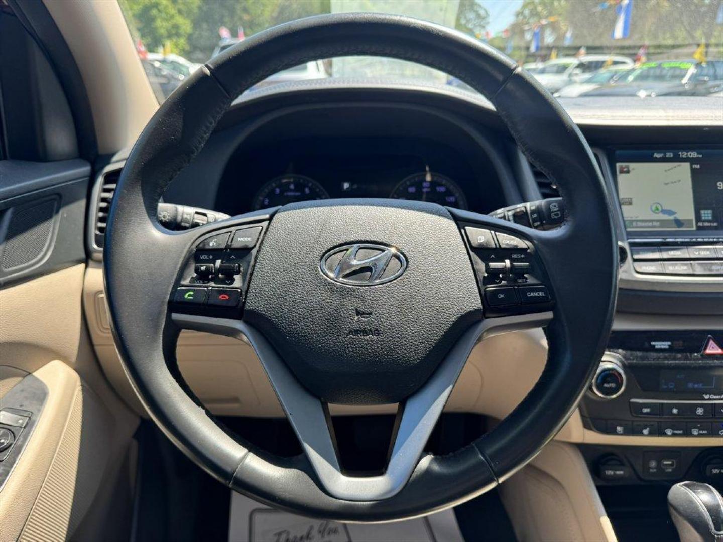 2016 Red /Grey Hyundai Tucson (KM8J33A23GU) with an 1.6l I-4 DI Dohc Cvvt T/C engine, Automatic transmission, located at 745 East Steele Rd., West Columbia, SC, 29170, (803) 755-9148, 33.927212, -81.148483 - Photo#7