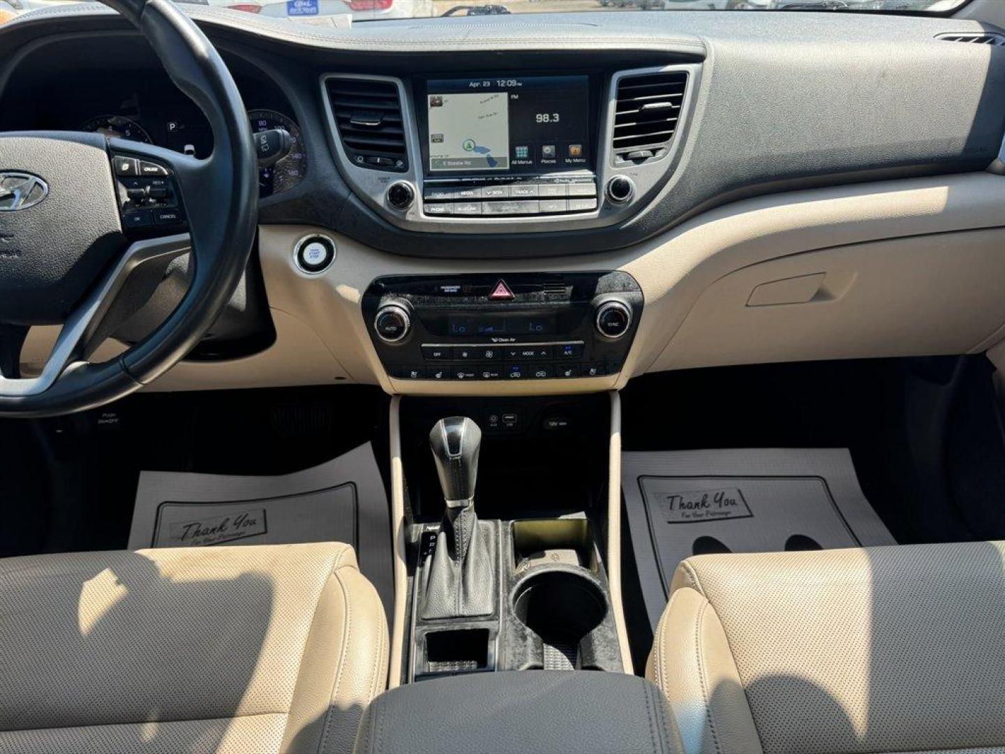 2016 Red /Grey Hyundai Tucson (KM8J33A23GU) with an 1.6l I-4 DI Dohc Cvvt T/C engine, Automatic transmission, located at 745 East Steele Rd., West Columbia, SC, 29170, (803) 755-9148, 33.927212, -81.148483 - Photo#11