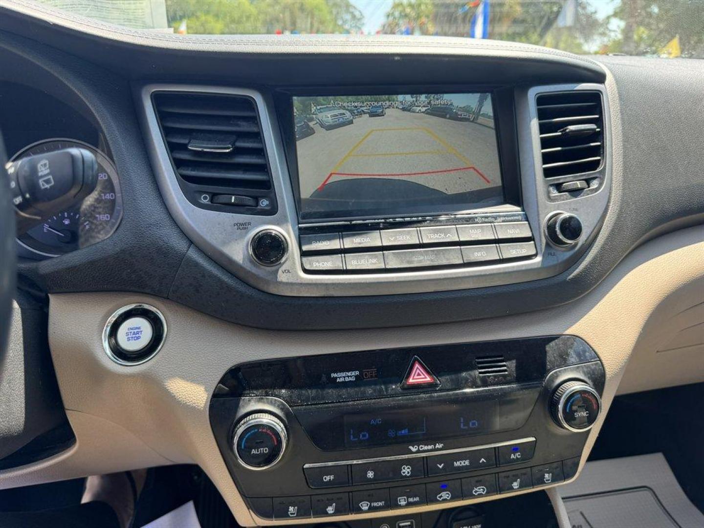 2016 Red /Grey Hyundai Tucson (KM8J33A23GU) with an 1.6l I-4 DI Dohc Cvvt T/C engine, Automatic transmission, located at 745 East Steele Rd., West Columbia, SC, 29170, (803) 755-9148, 33.927212, -81.148483 - Photo#13