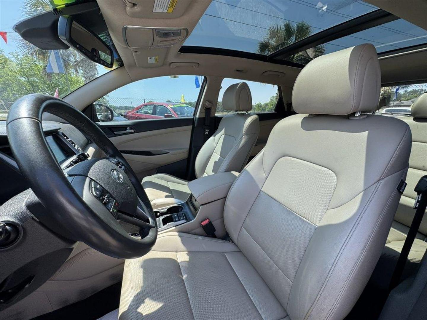 2016 Red /Grey Hyundai Tucson (KM8J33A23GU) with an 1.6l I-4 DI Dohc Cvvt T/C engine, Automatic transmission, located at 745 East Steele Rd., West Columbia, SC, 29170, (803) 755-9148, 33.927212, -81.148483 - Photo#21