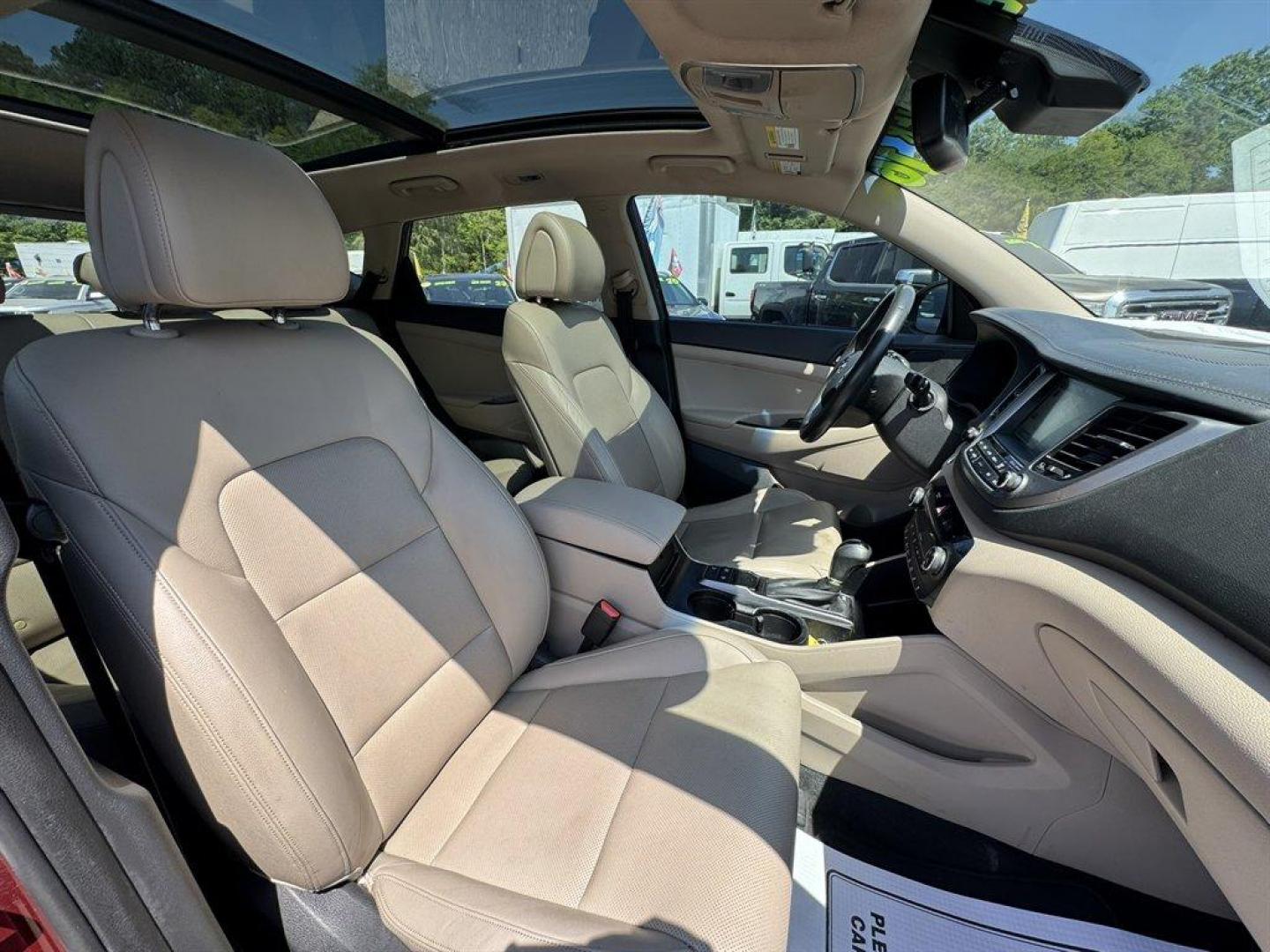 2016 Red /Grey Hyundai Tucson (KM8J33A23GU) with an 1.6l I-4 DI Dohc Cvvt T/C engine, Automatic transmission, located at 745 East Steele Rd., West Columbia, SC, 29170, (803) 755-9148, 33.927212, -81.148483 - Photo#28