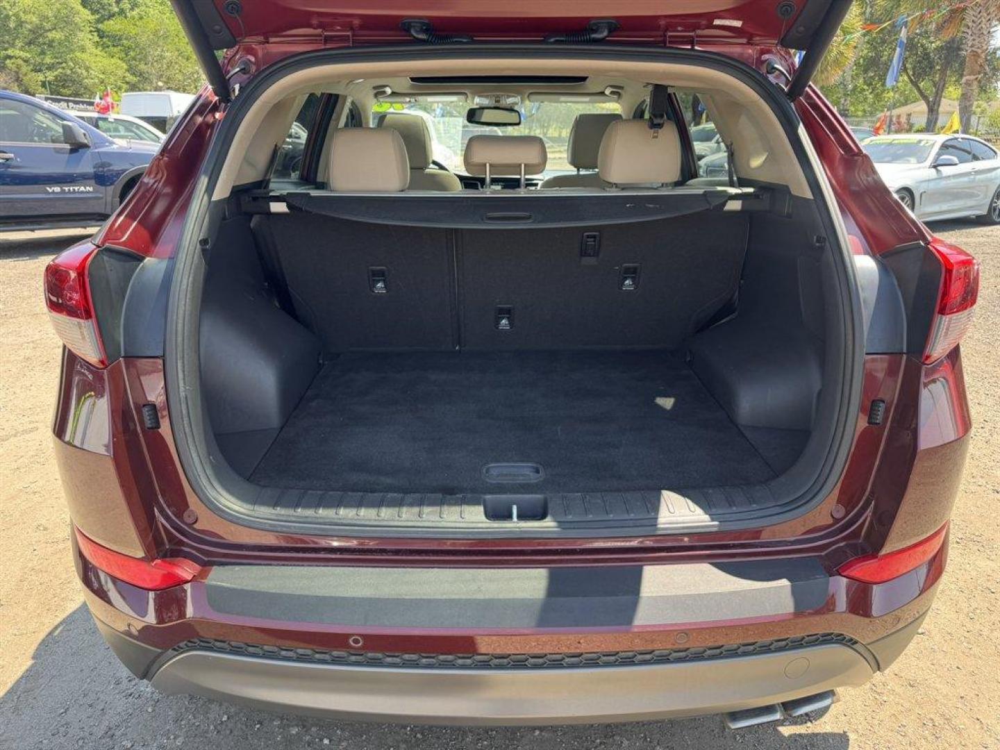 2016 Red /Grey Hyundai Tucson (KM8J33A23GU) with an 1.6l I-4 DI Dohc Cvvt T/C engine, Automatic transmission, located at 745 East Steele Rd., West Columbia, SC, 29170, (803) 755-9148, 33.927212, -81.148483 - Photo#30