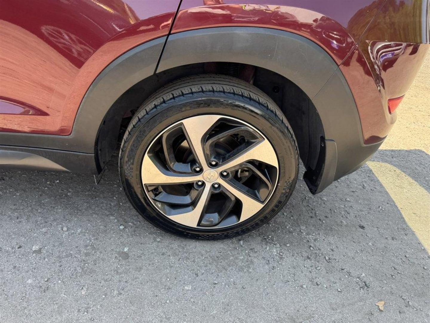 2016 Red /Grey Hyundai Tucson (KM8J33A23GU) with an 1.6l I-4 DI Dohc Cvvt T/C engine, Automatic transmission, located at 745 East Steele Rd., West Columbia, SC, 29170, (803) 755-9148, 33.927212, -81.148483 - Photo#35
