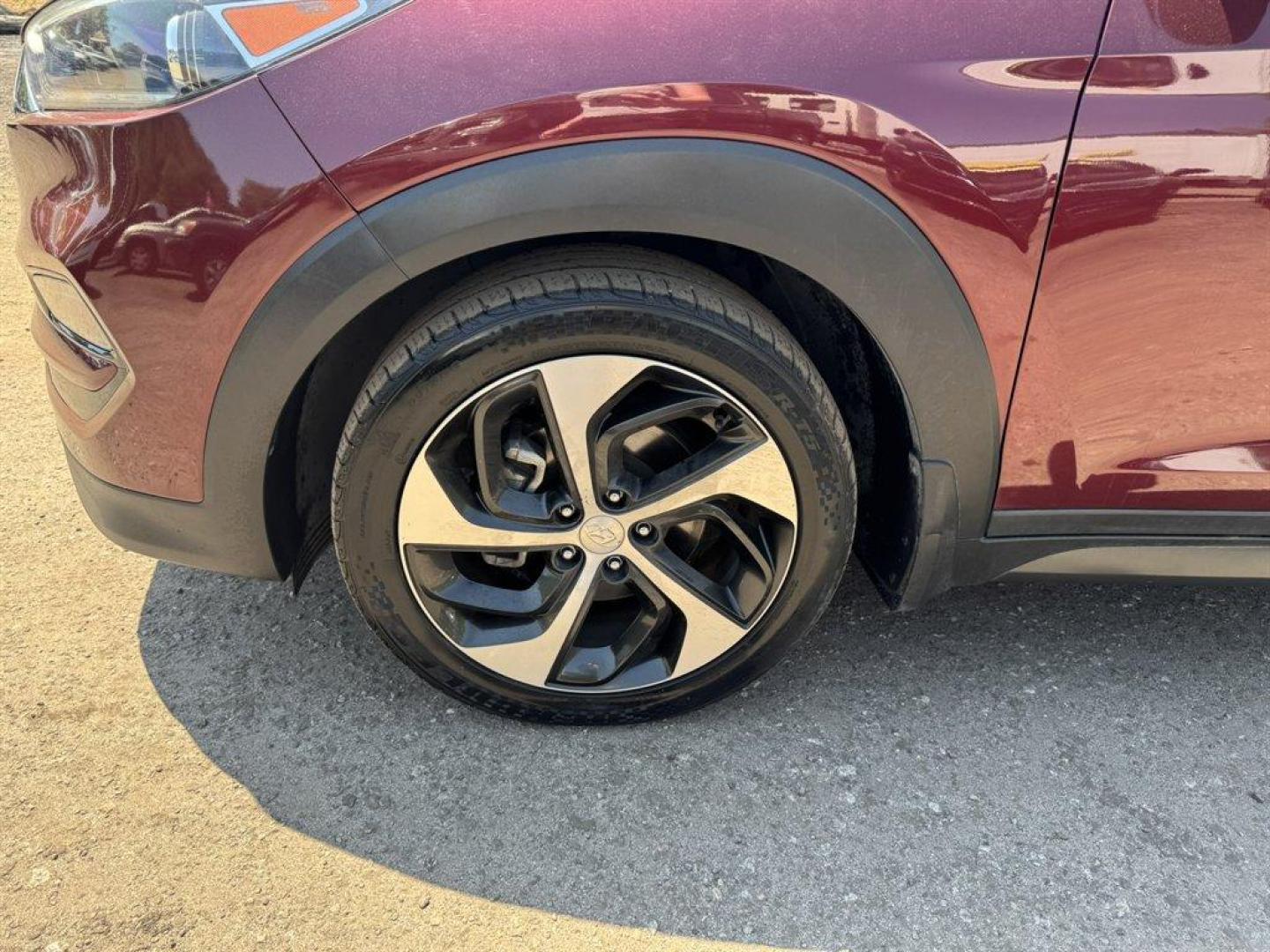 2016 Red /Grey Hyundai Tucson (KM8J33A23GU) with an 1.6l I-4 DI Dohc Cvvt T/C engine, Automatic transmission, located at 745 East Steele Rd., West Columbia, SC, 29170, (803) 755-9148, 33.927212, -81.148483 - Photo#36