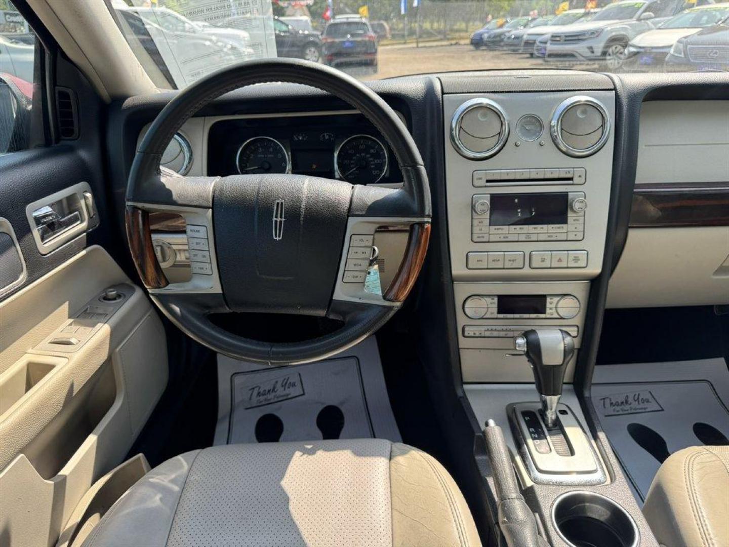 2007 Red /Tan Lincoln MKZ (3LNHM26T17R) with an 3.5l V6 SFI Dohc 24v 3.5l engine, Auto transmission, located at 745 East Steele Rd., West Columbia, SC, 29170, (803) 755-9148, 33.927212, -81.148483 - Photo#6