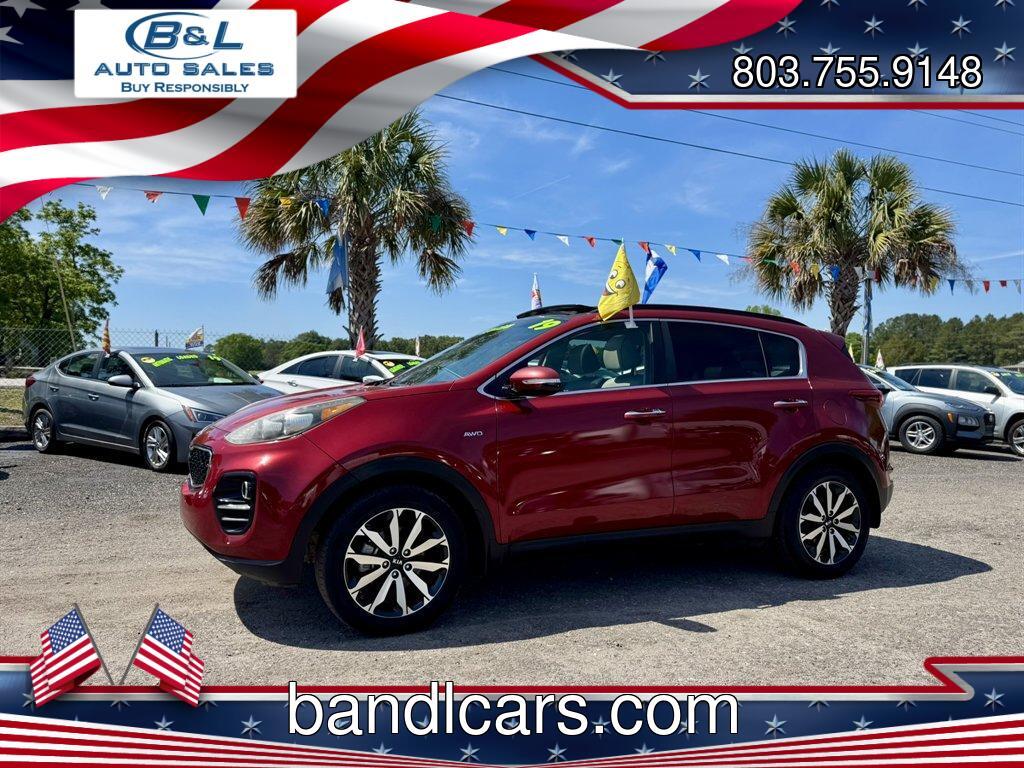 2019 Red /Grey Kia Sportage (KNDPNCAC7K7) with an 2.4l I-4 DI Dohc 2.4l engine, Automatic transmission, located at 745 East Steele Rd., West Columbia, SC, 29170, (803) 755-9148, 33.927212, -81.148483 - Photo#0