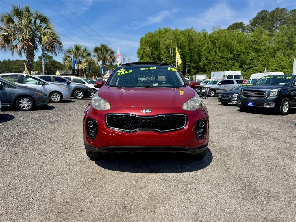 2019 Red /Grey Kia Sportage (KNDPNCAC7K7) with an 2.4l I-4 DI Dohc 2.4l engine, Automatic transmission, located at 745 East Steele Rd., West Columbia, SC, 29170, (803) 755-9148, 33.927212, -81.148483 - Photo#1