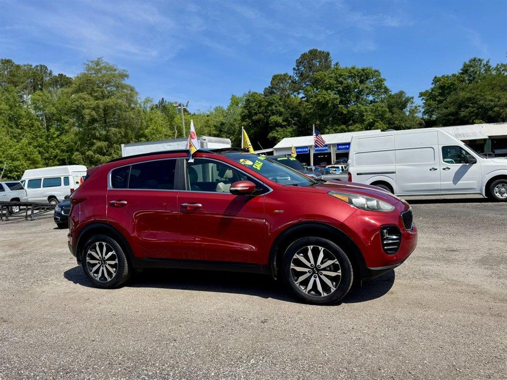 2019 Red /Grey Kia Sportage (KNDPNCAC7K7) with an 2.4l I-4 DI Dohc 2.4l engine, Automatic transmission, located at 745 East Steele Rd., West Columbia, SC, 29170, (803) 755-9148, 33.927212, -81.148483 - Photo#2