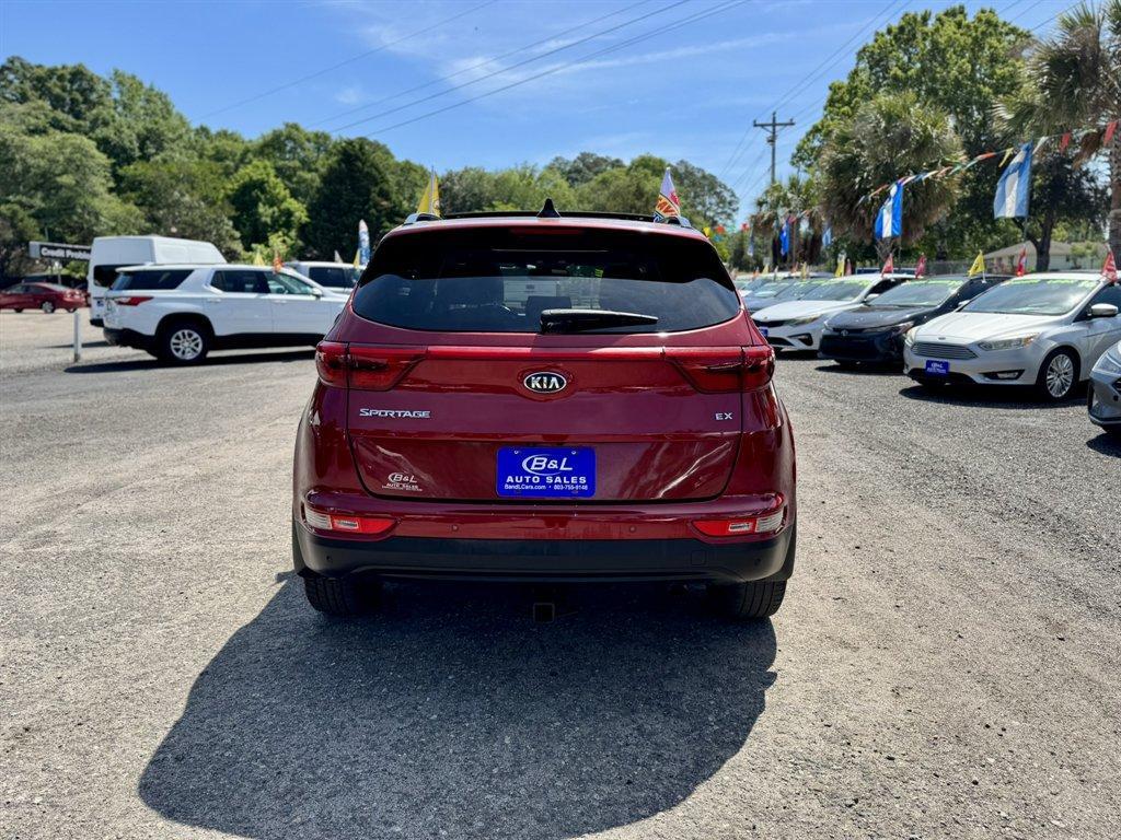 2019 Red /Grey Kia Sportage (KNDPNCAC7K7) with an 2.4l I-4 DI Dohc 2.4l engine, Automatic transmission, located at 745 East Steele Rd., West Columbia, SC, 29170, (803) 755-9148, 33.927212, -81.148483 - Photo#4