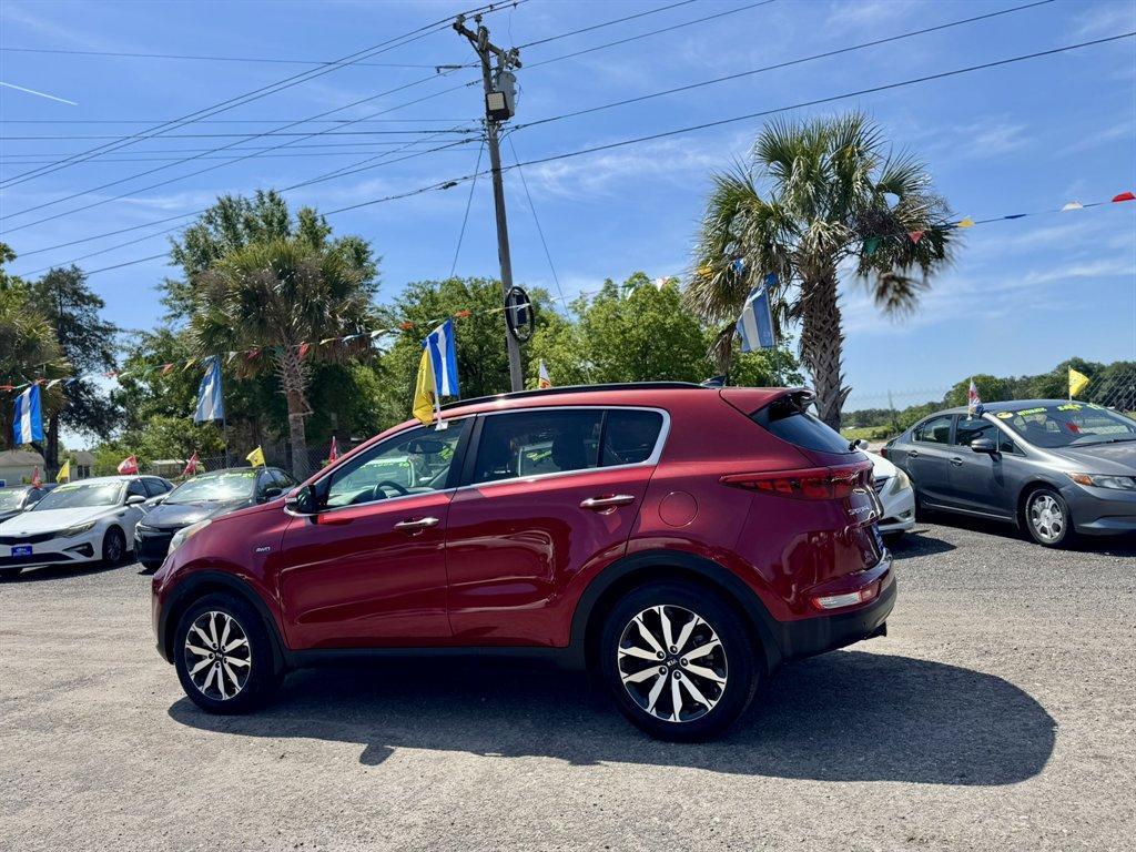 2019 Red /Grey Kia Sportage (KNDPNCAC7K7) with an 2.4l I-4 DI Dohc 2.4l engine, Automatic transmission, located at 745 East Steele Rd., West Columbia, SC, 29170, (803) 755-9148, 33.927212, -81.148483 - Photo#5