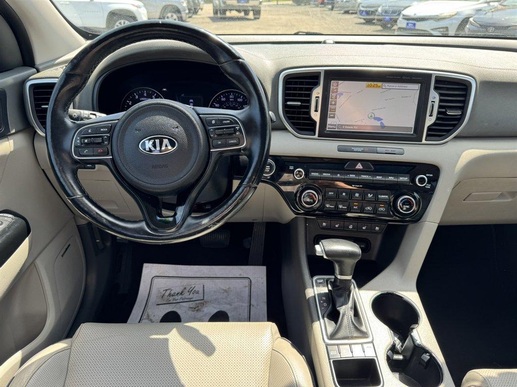 2019 Red /Grey Kia Sportage (KNDPNCAC7K7) with an 2.4l I-4 DI Dohc 2.4l engine, Automatic transmission, located at 745 East Steele Rd., West Columbia, SC, 29170, (803) 755-9148, 33.927212, -81.148483 - Photo#6