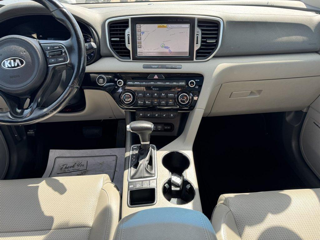 2019 Red /Grey Kia Sportage (KNDPNCAC7K7) with an 2.4l I-4 DI Dohc 2.4l engine, Automatic transmission, located at 745 East Steele Rd., West Columbia, SC, 29170, (803) 755-9148, 33.927212, -81.148483 - Photo#11