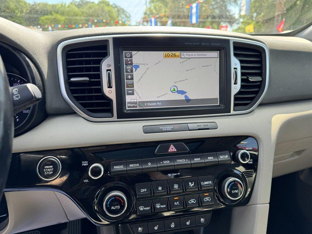 2019 Red /Grey Kia Sportage (KNDPNCAC7K7) with an 2.4l I-4 DI Dohc 2.4l engine, Automatic transmission, located at 745 East Steele Rd., West Columbia, SC, 29170, (803) 755-9148, 33.927212, -81.148483 - Photo#12