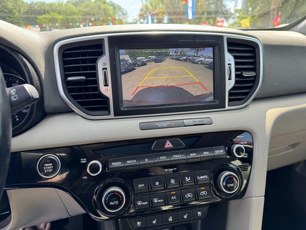 2019 Red /Grey Kia Sportage (KNDPNCAC7K7) with an 2.4l I-4 DI Dohc 2.4l engine, Automatic transmission, located at 745 East Steele Rd., West Columbia, SC, 29170, (803) 755-9148, 33.927212, -81.148483 - Photo#13